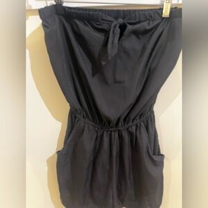 Women’s adorable black strapless romper.